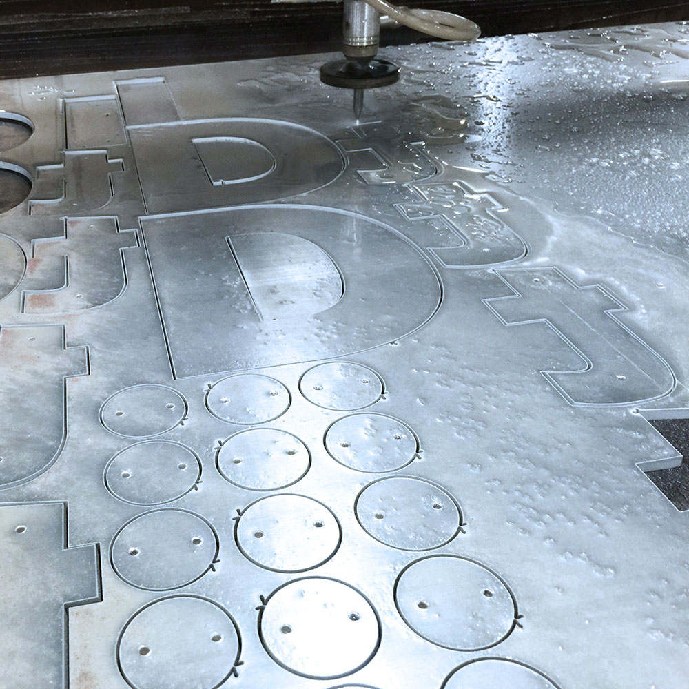 NEO Series pump waterjet cutting aluminum parts